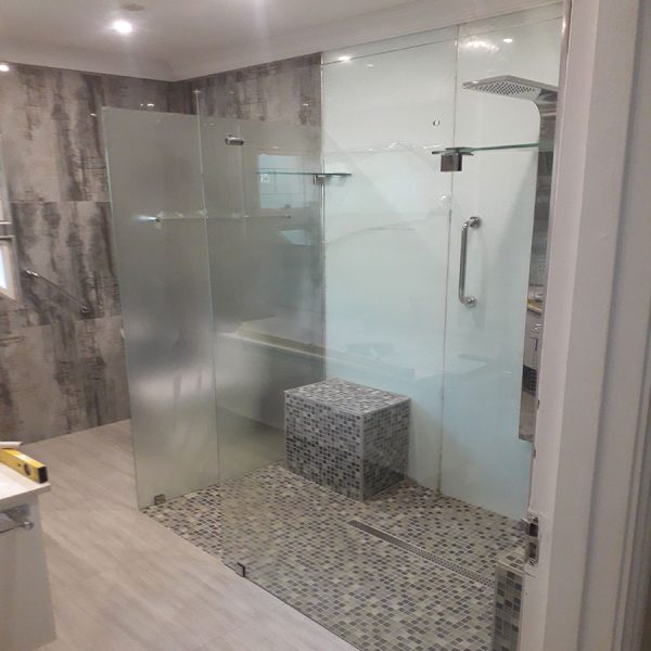 Frameless Two Walk in Shower Screens With Stabilizing Glass Shelves