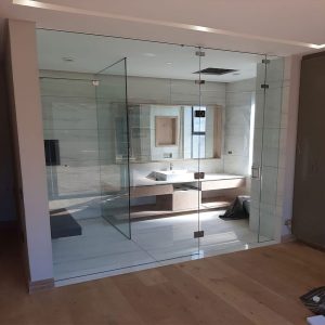Glass bathroom wall with screen